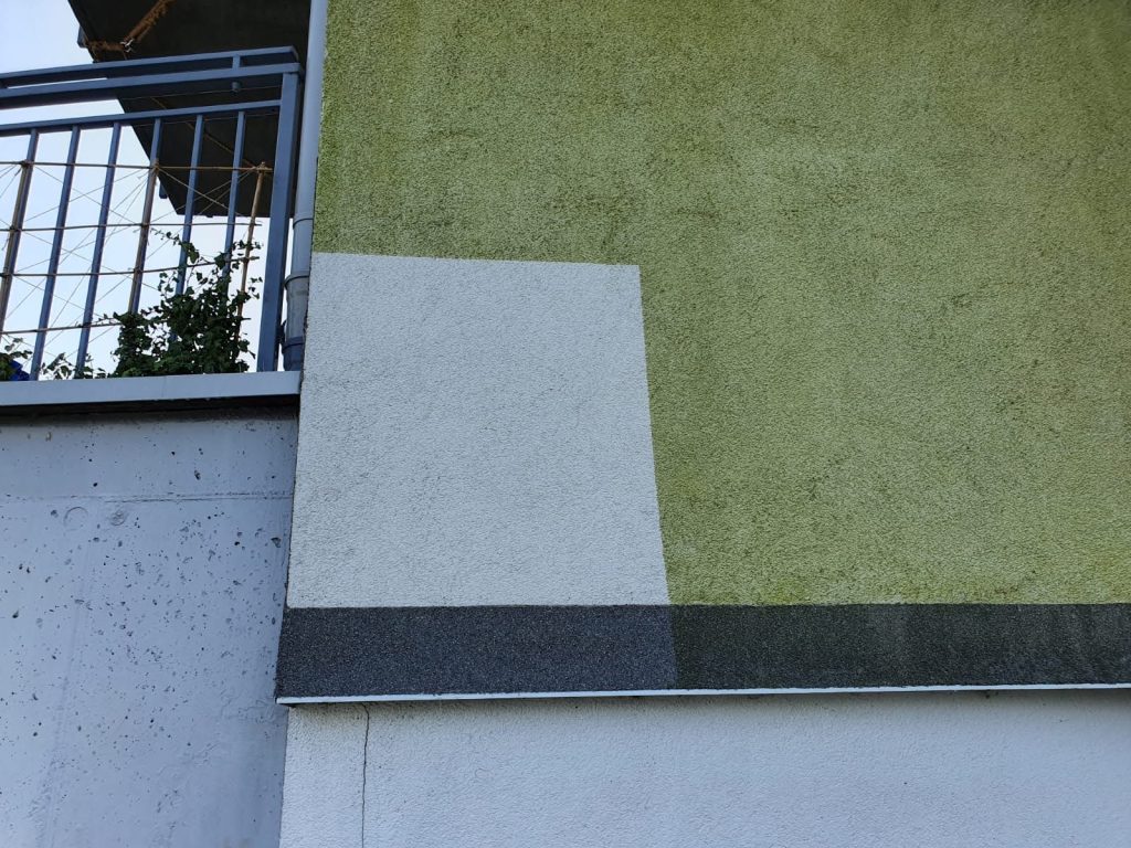 Próba czyszczenia elewacji budynku wielorodzinnego w Gdańsku